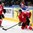 MINSK, BELARUS - MAY 9: Switzerland's Andres Ambuhl #10 plays the puck from his knees while Yannick Weber #77 and Russia's Sergei Shirokov #52 look on during preliminary round action at the 2014 IIHF Ice Hockey World Championship. (Photo by Andre Ringuette/HHOF-IIHF Images)

